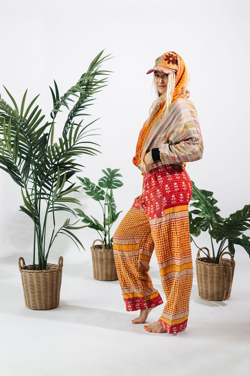 a woman in a red and orange outfit