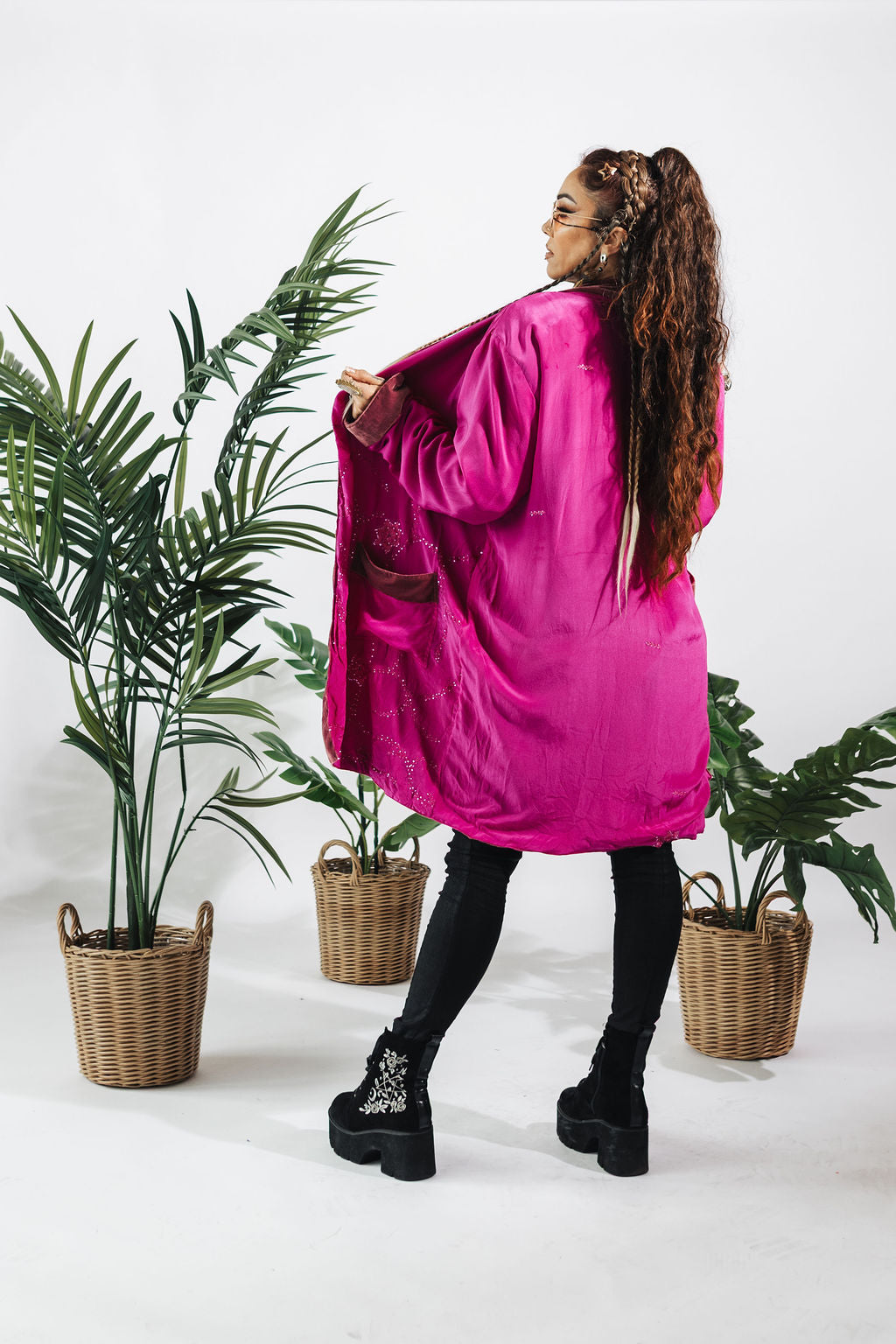 a woman in a pink coat