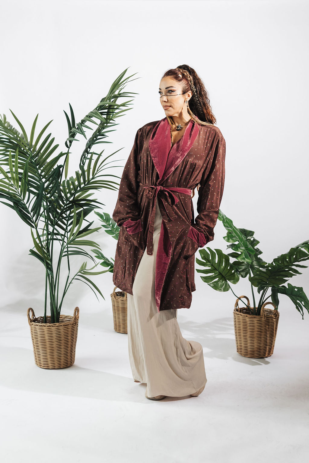 a woman in a robe and a long skirt