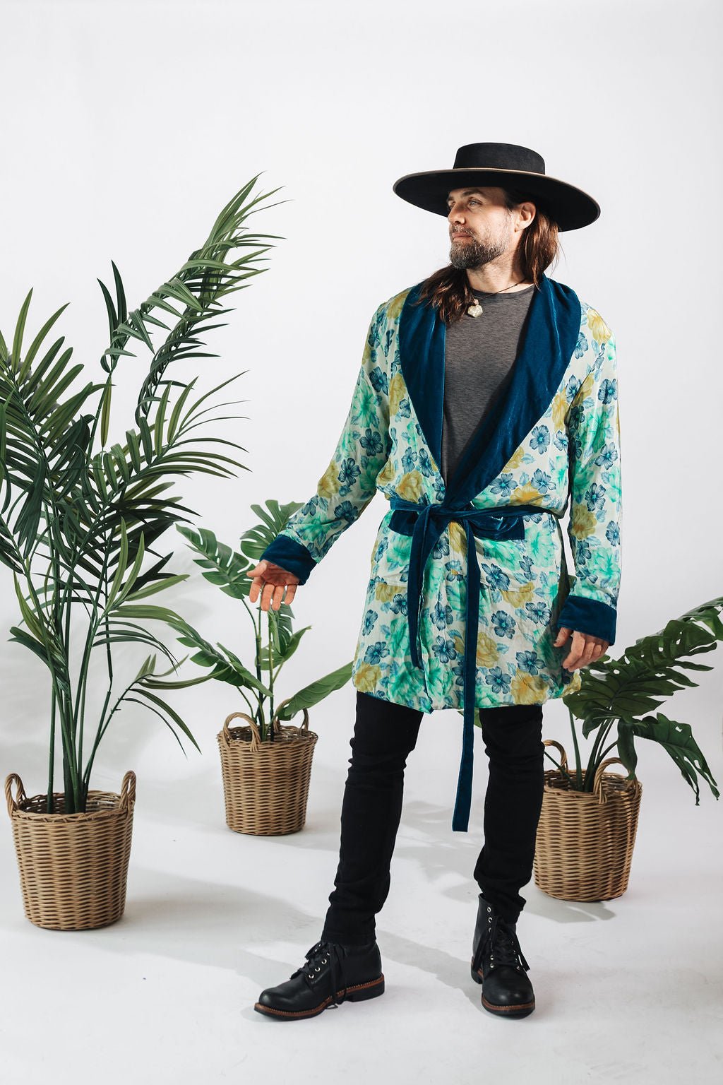 a man in a robe and hat